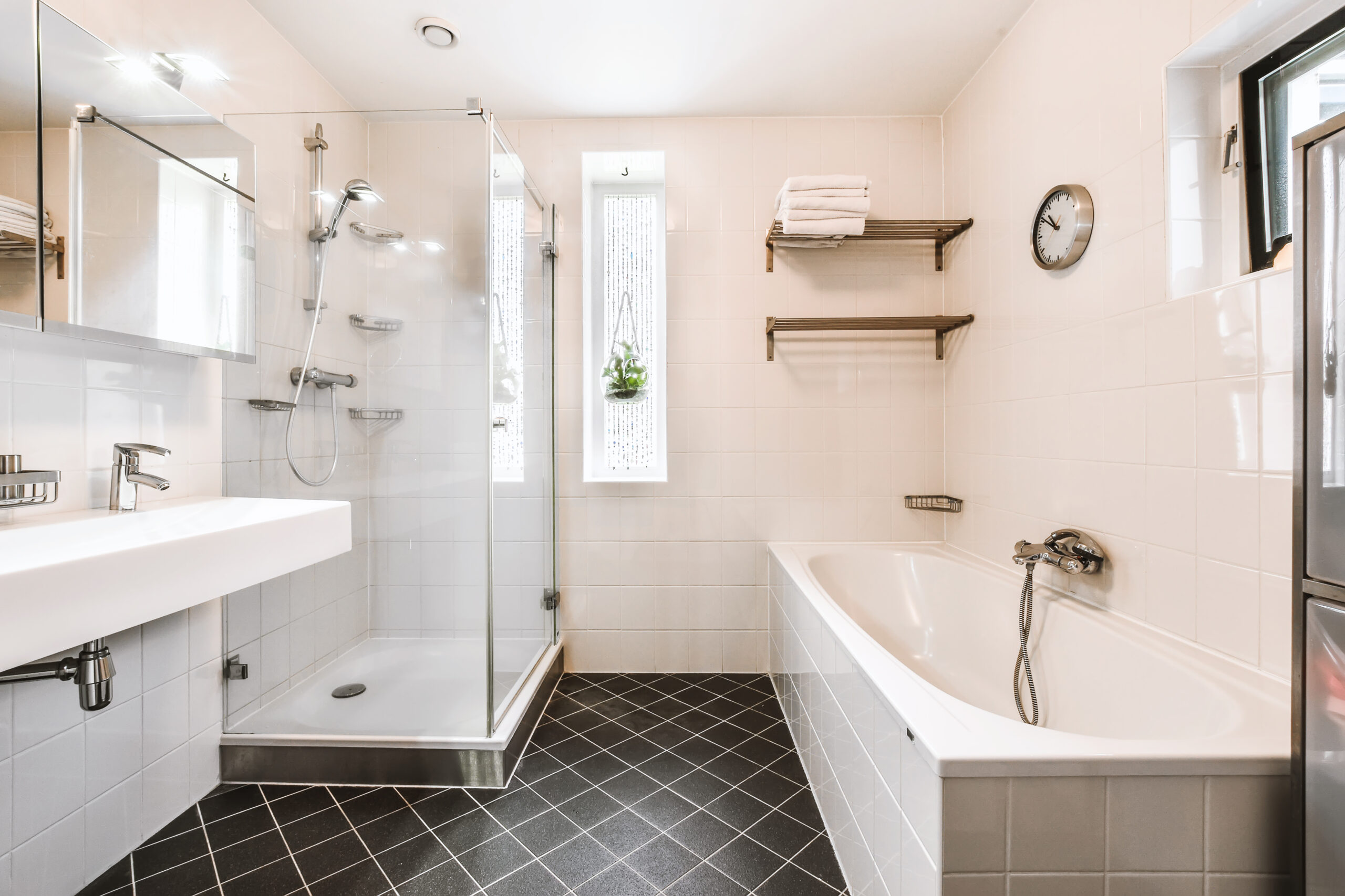 Modern renovated bathroom with tiled shower